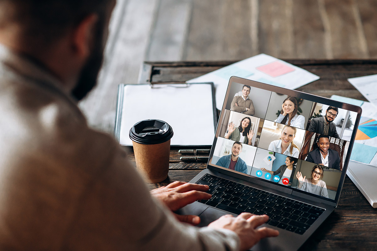 Young man communicates via video call with business partners