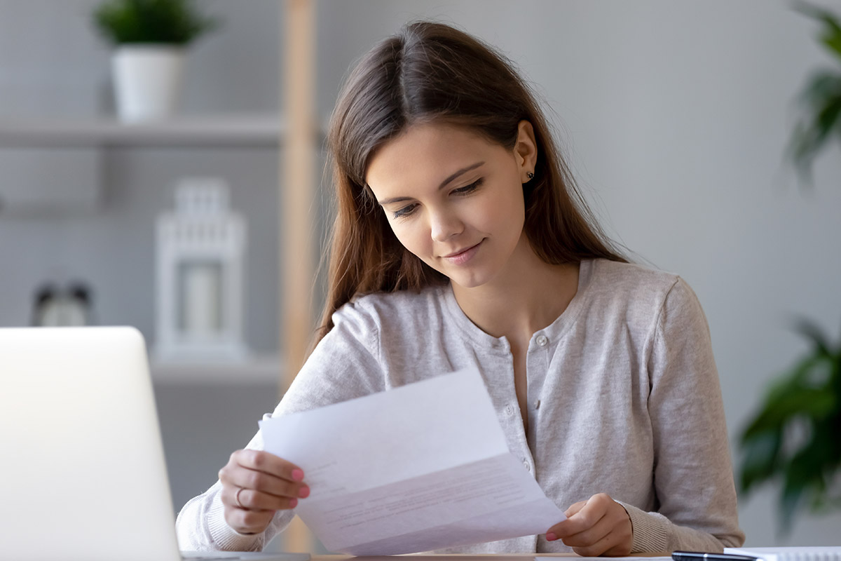 woman reading a letter