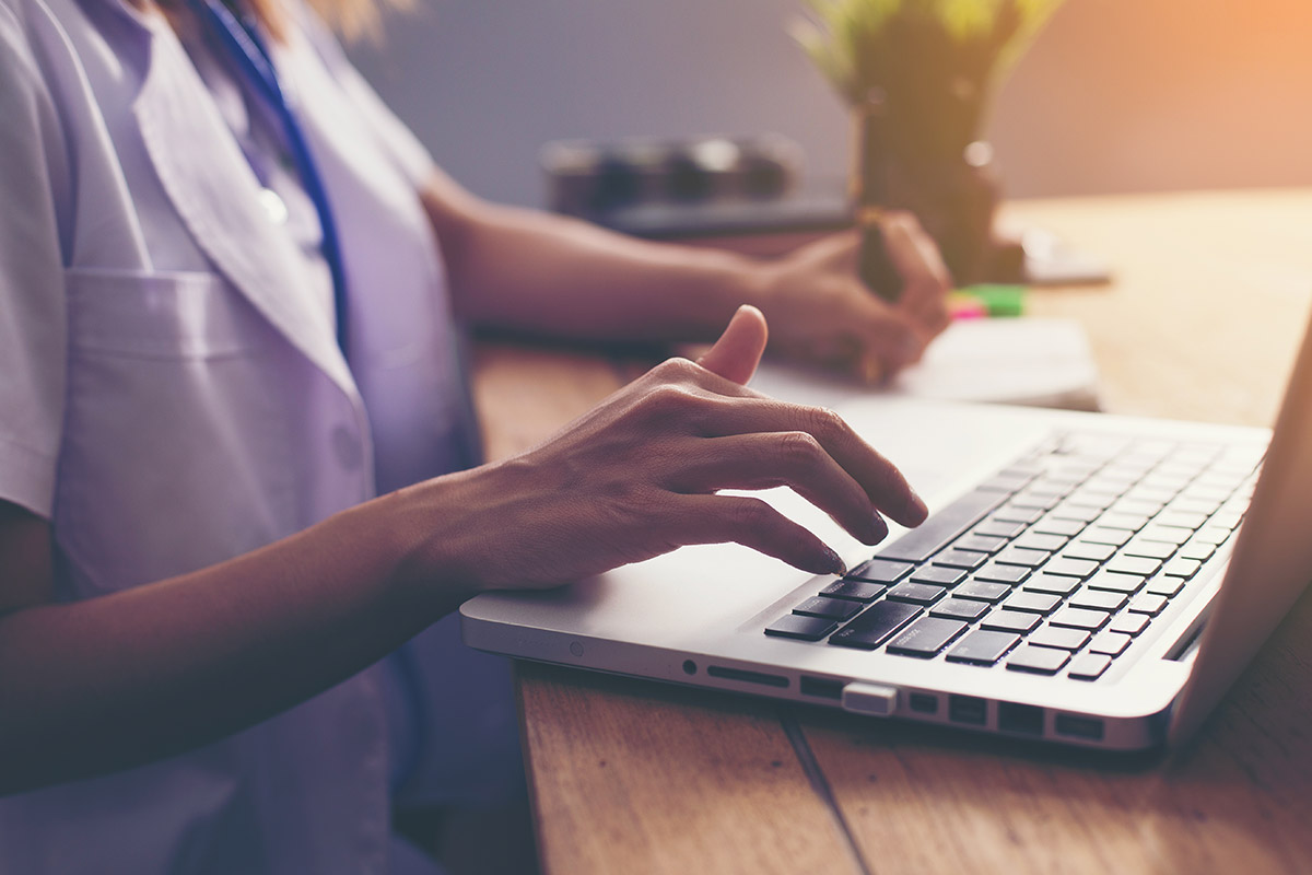 nurse using a computer